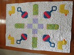 Ducks and Rattles baby quilt