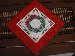 Quilted cross stitch wreath wall hanging/table topper