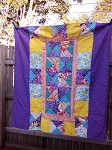Kaleidoscope Quilt with Polka Dot back