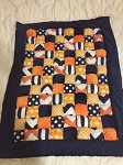 Lincoln's Navy and Orange Puff Quilt